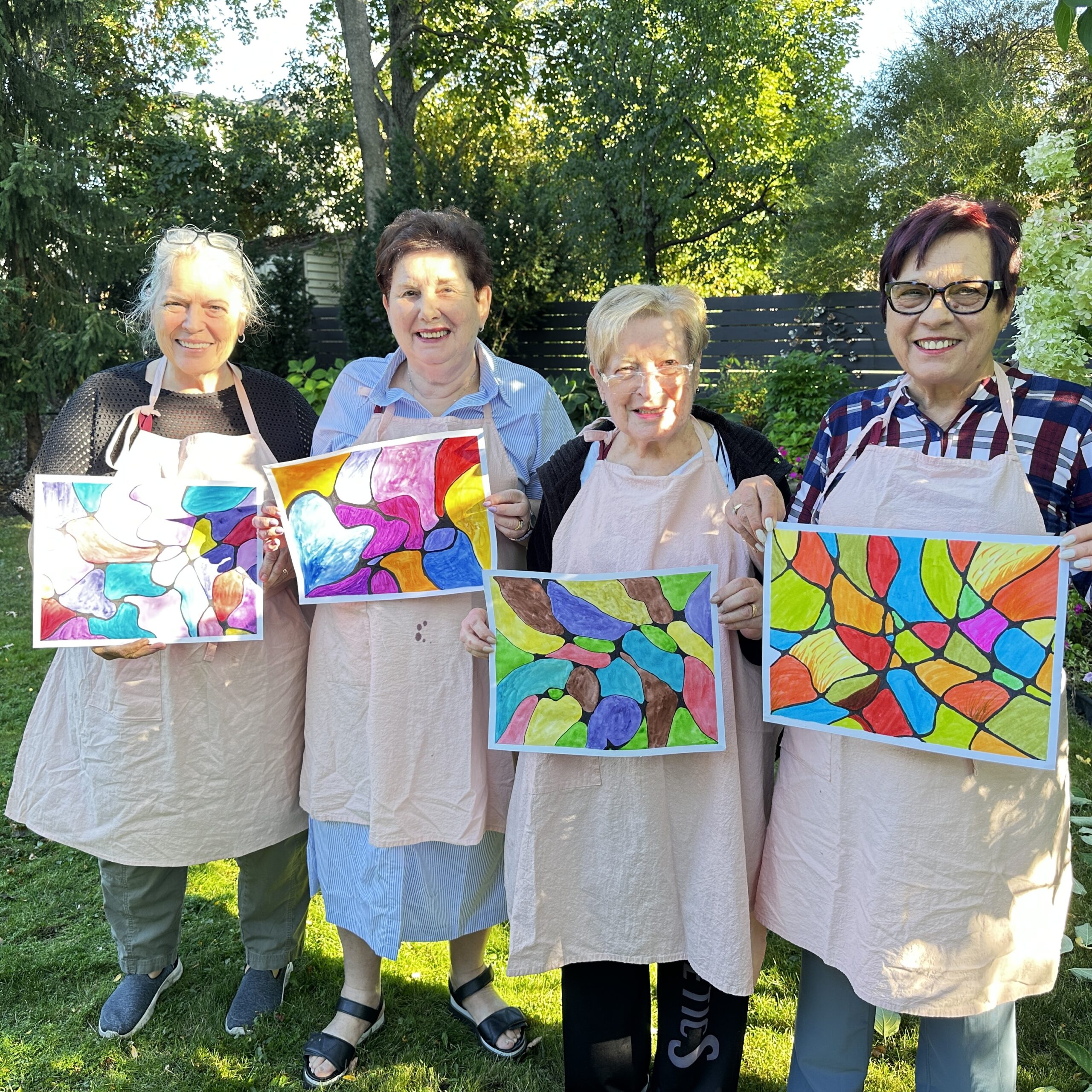 Neurographic workshop-Toronto-Heartfelt workshops- Guests showing there abstract art- Multicolour pictures